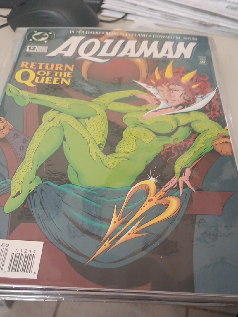 DC Aquaman Comic Cover – Green-Suited Queen with Gold Trident In Sleeve